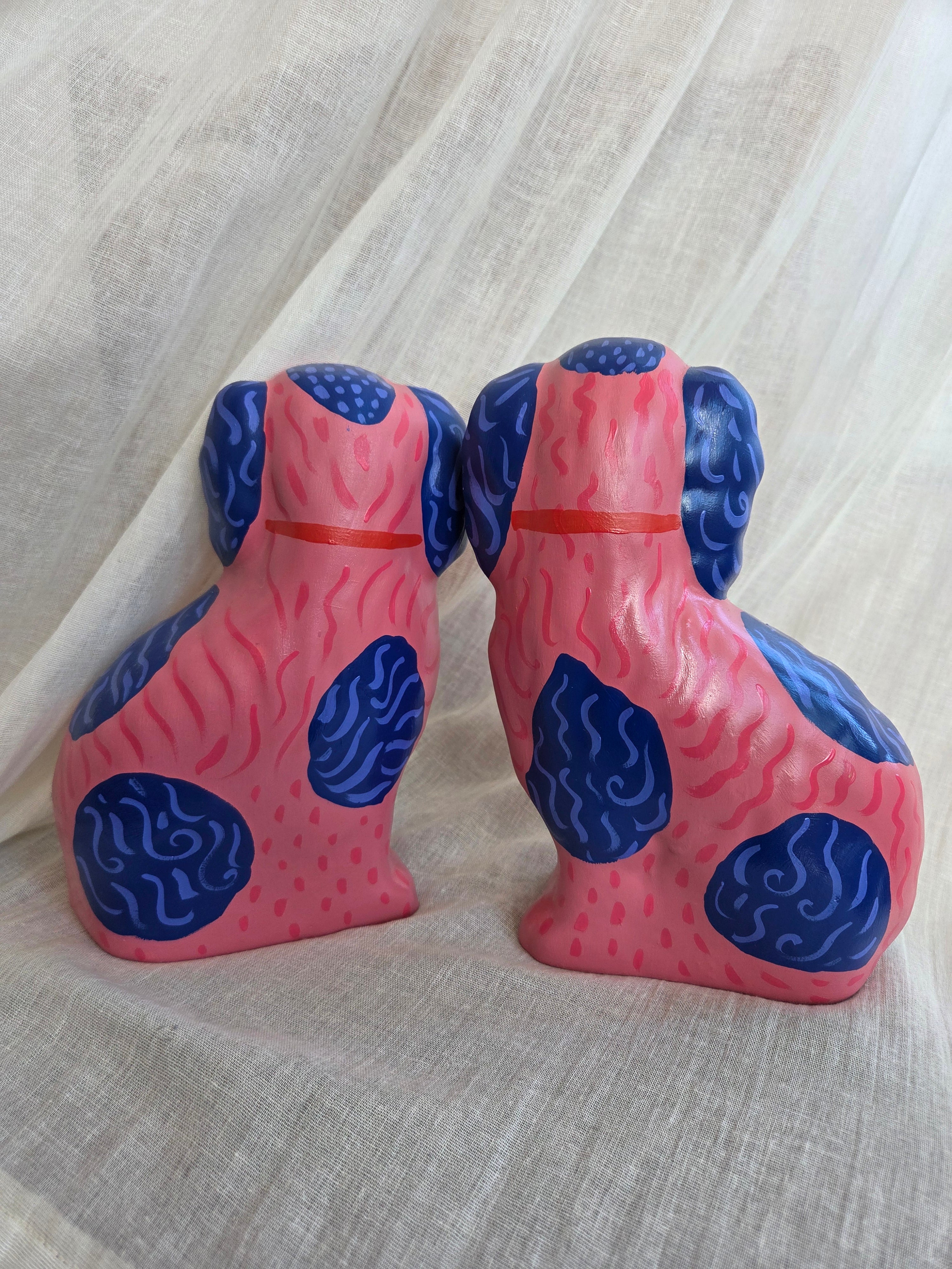 Medium Hand Painted Pair of Pink and Blue Mantle Dogs