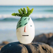 Modern artistic face motif vase - green hair