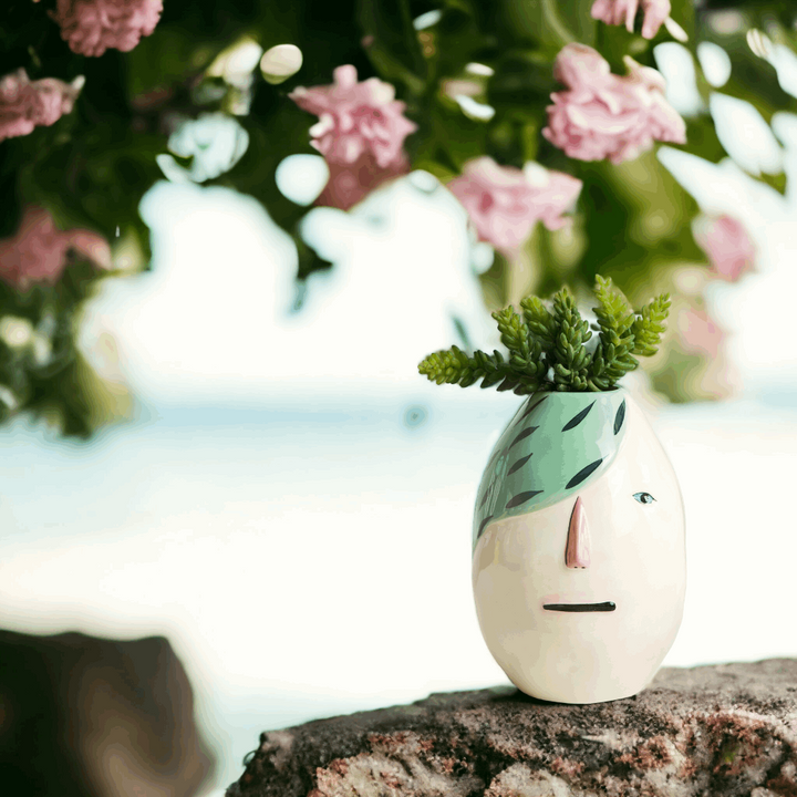 Modern artistic face motif vase - green hair