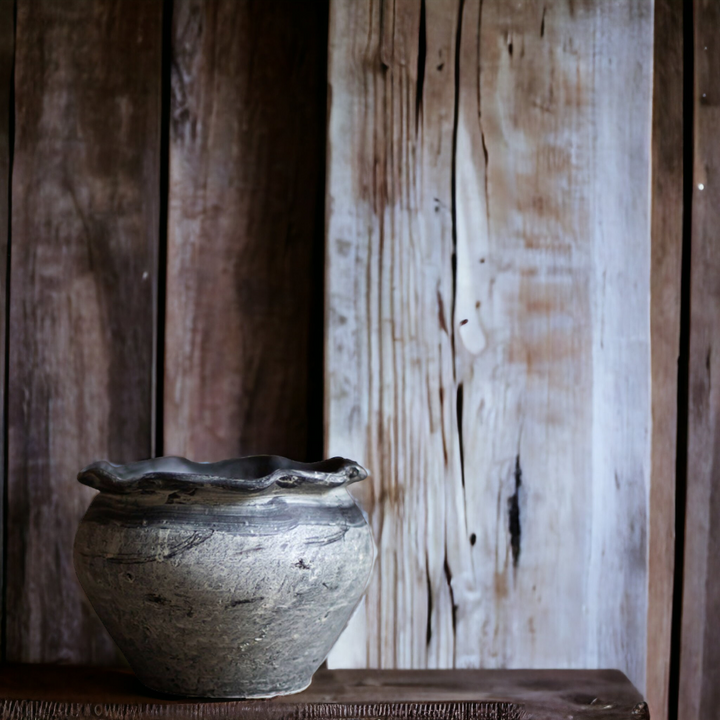 Handmade grey vase with wavy opening
