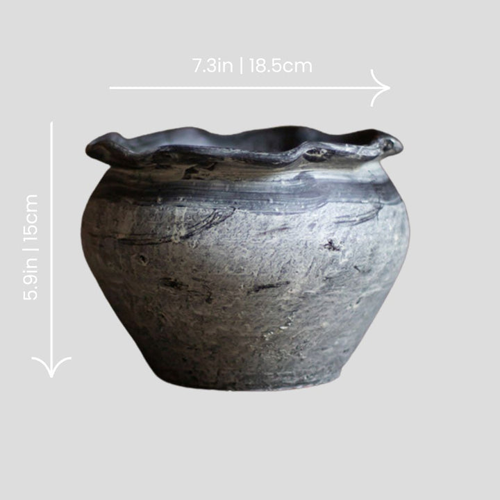 Handmade grey vase with wavy opening