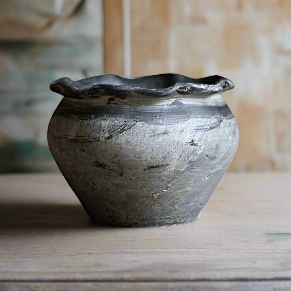 Handmade grey vase with wavy opening