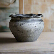 Handmade grey vase with wavy opening