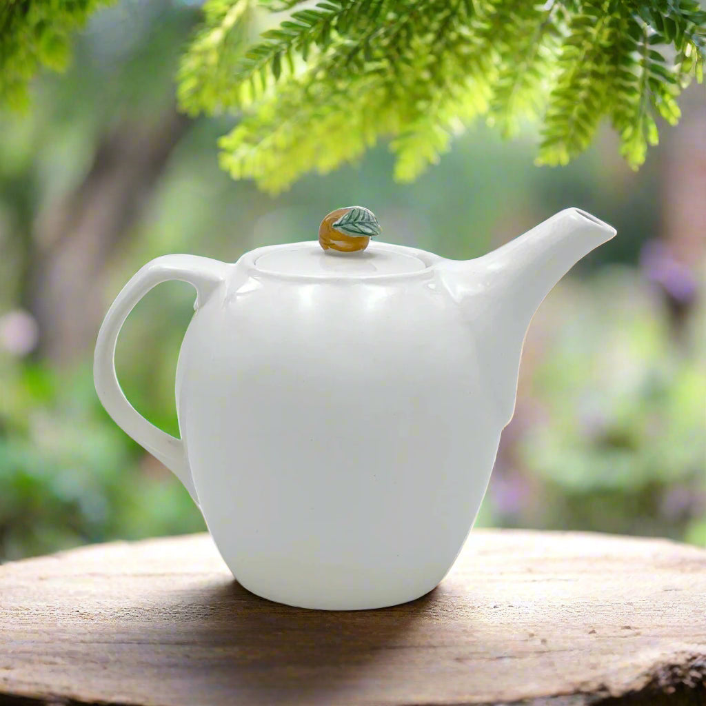 Cream Teapot with Orange Finial