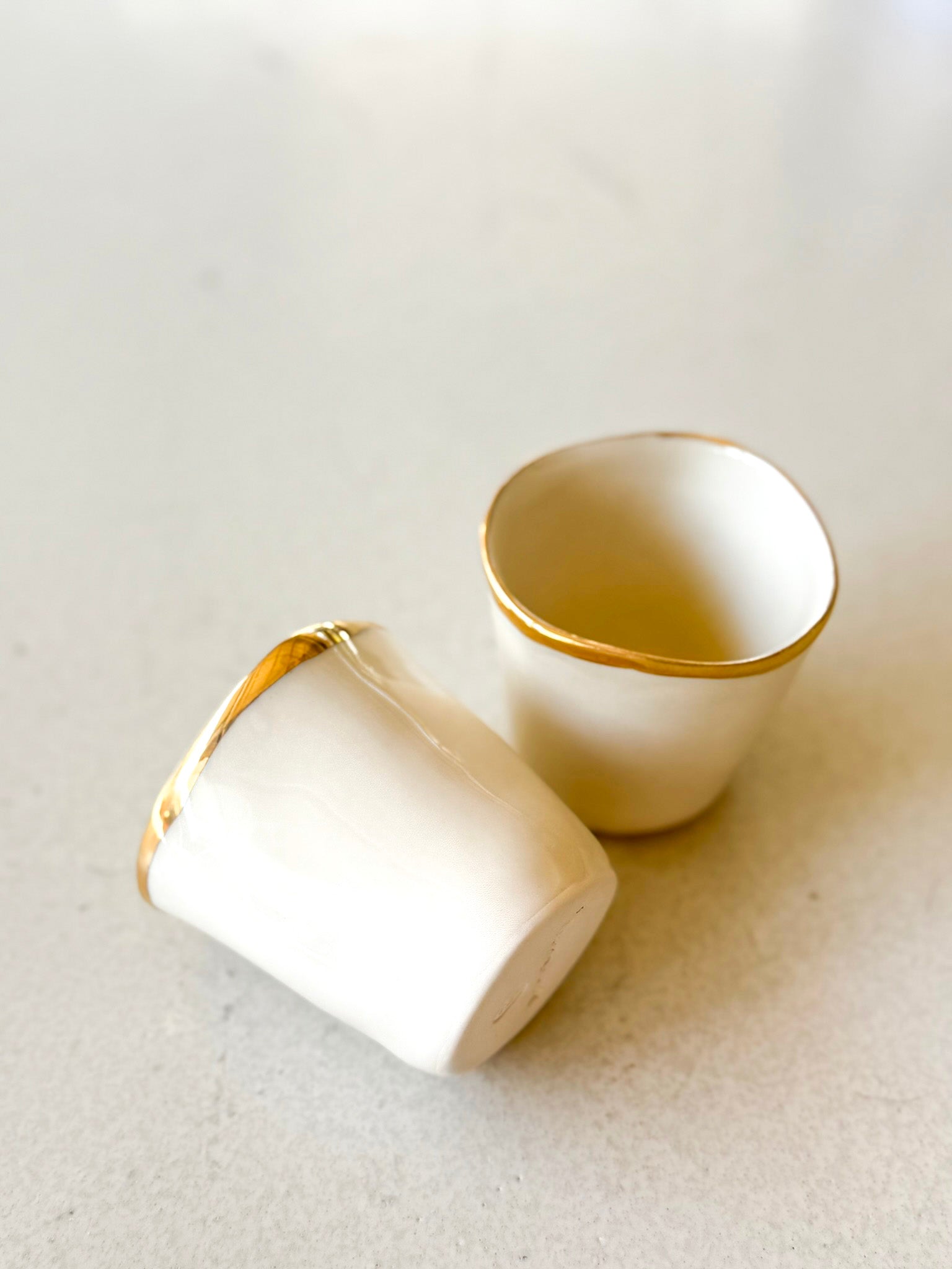 Porcelain Set of 2 Cups With Gold Rim