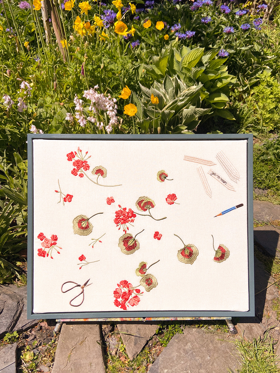 Geranium cuttings framed embroidered canvas