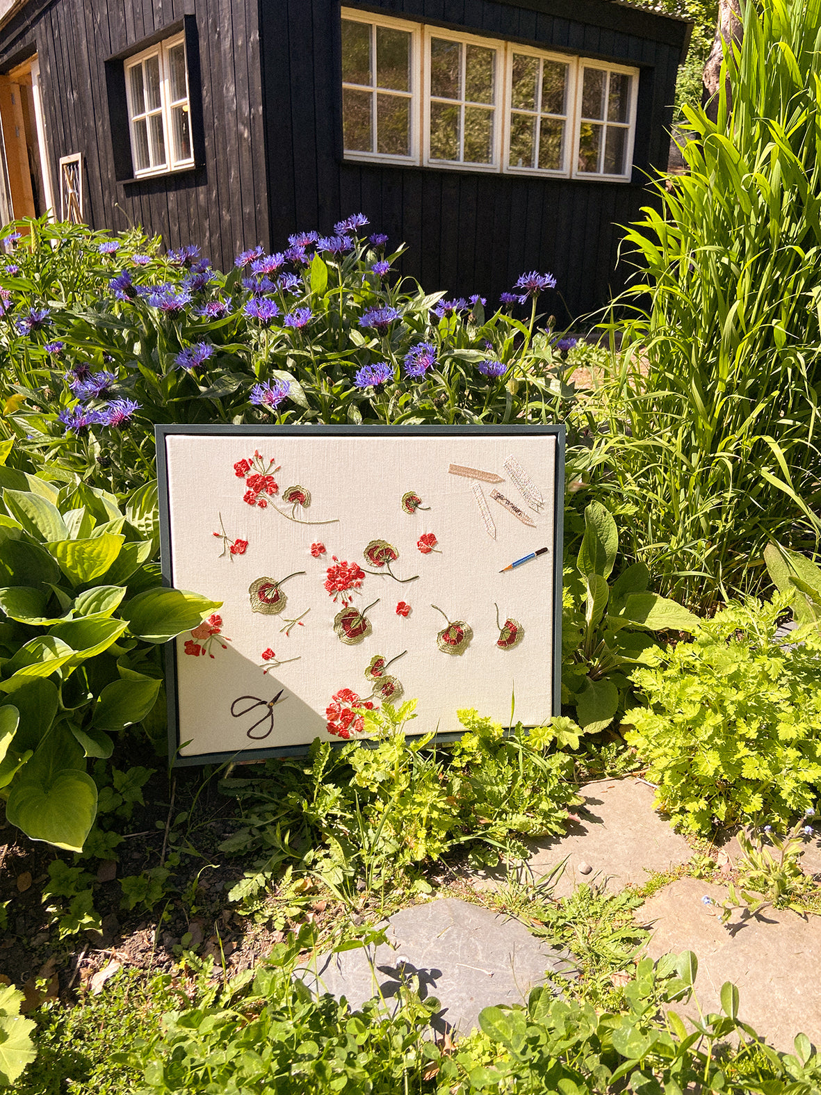 Geranium cuttings framed embroidered canvas