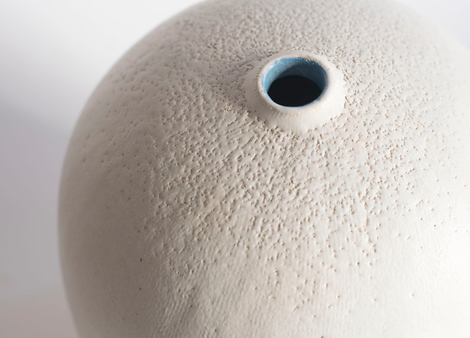 Handmade sculptural matte white ceramic vase