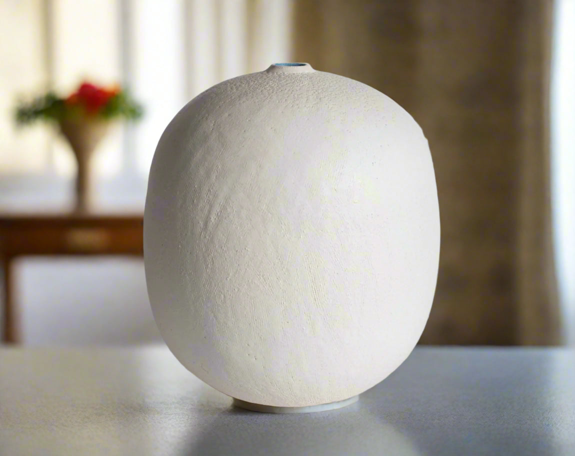 Handmade sculptural matte white ceramic vase