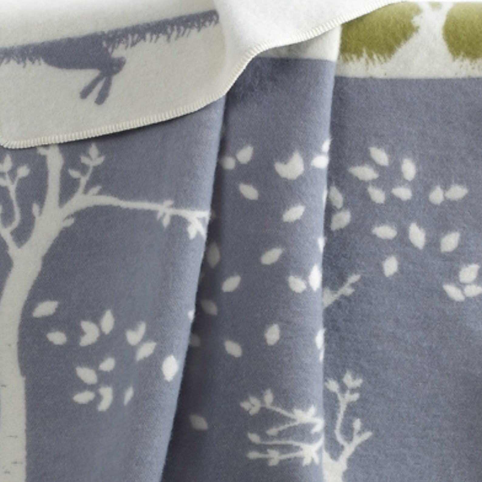 Glow Wool Blanket | Hare and Leaves Pattern | Grey and Green Throw |