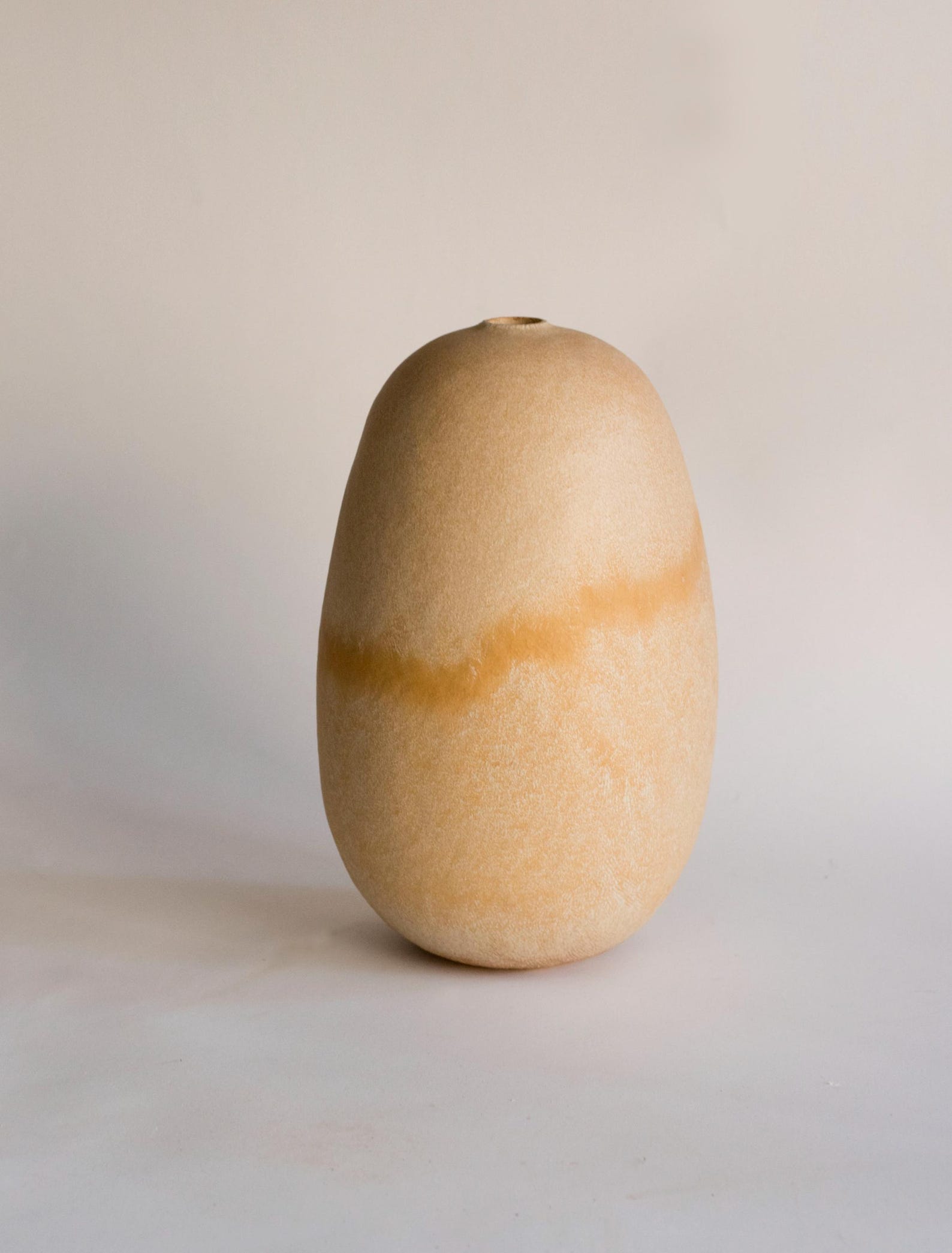 Handmade beige oval vase