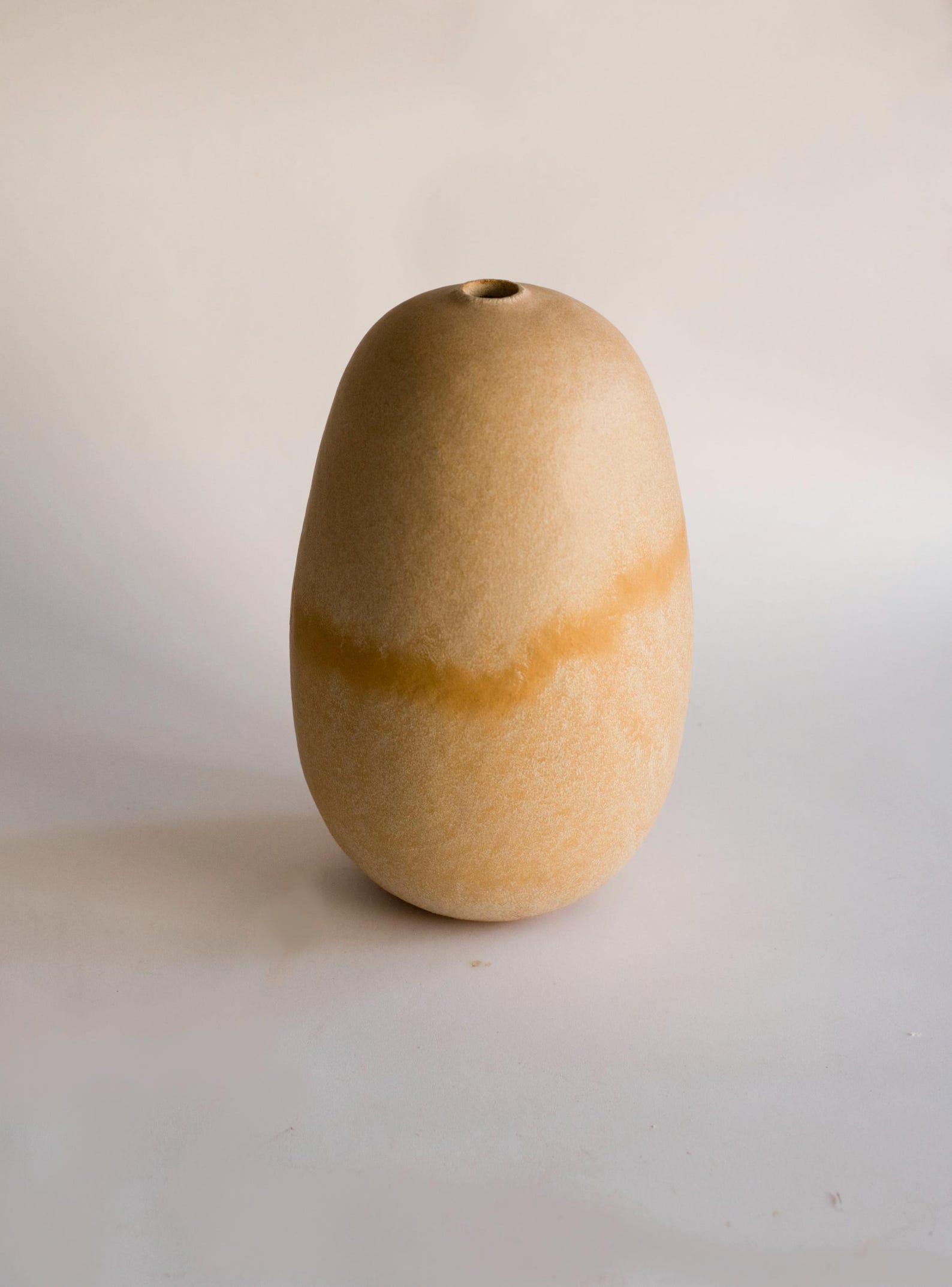 Handmade beige oval vase
