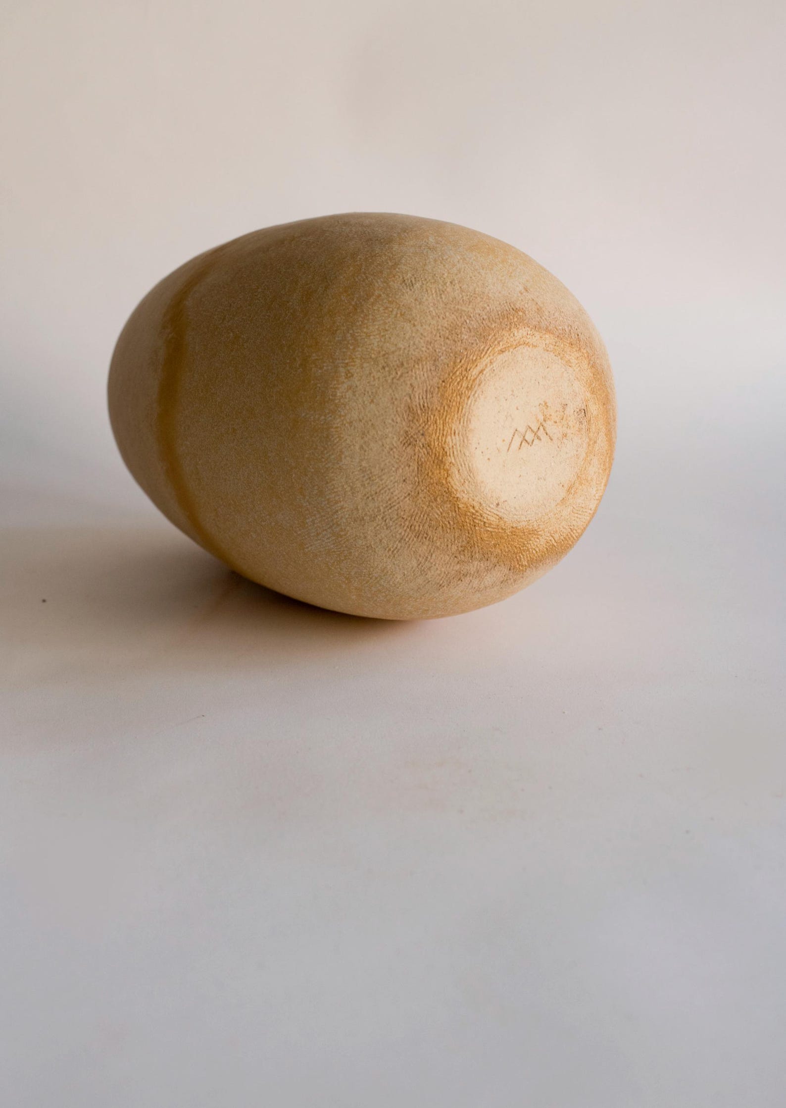 Handmade beige oval vase