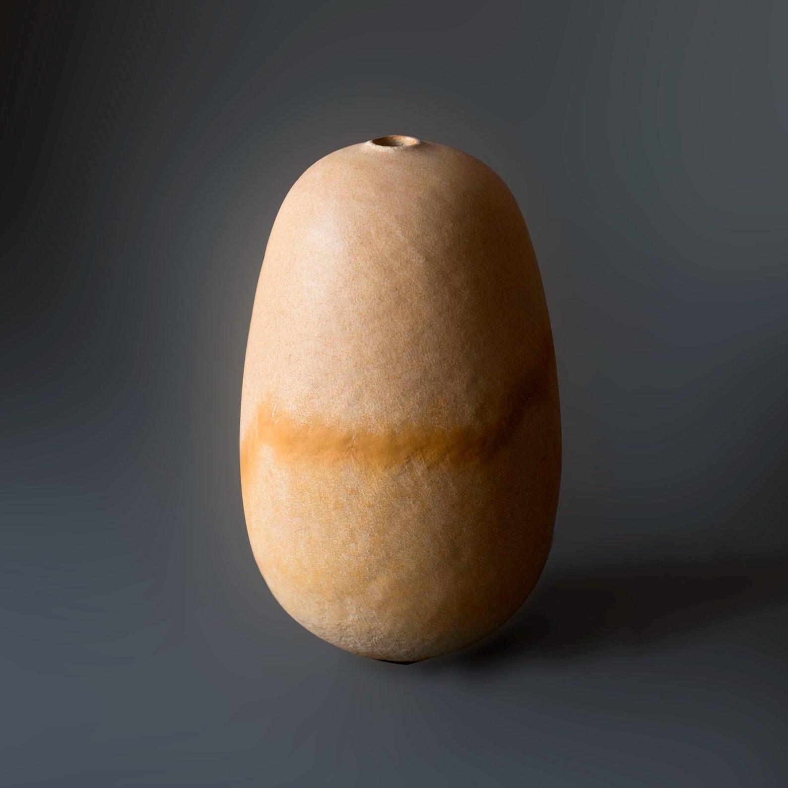 Handmade beige oval vase