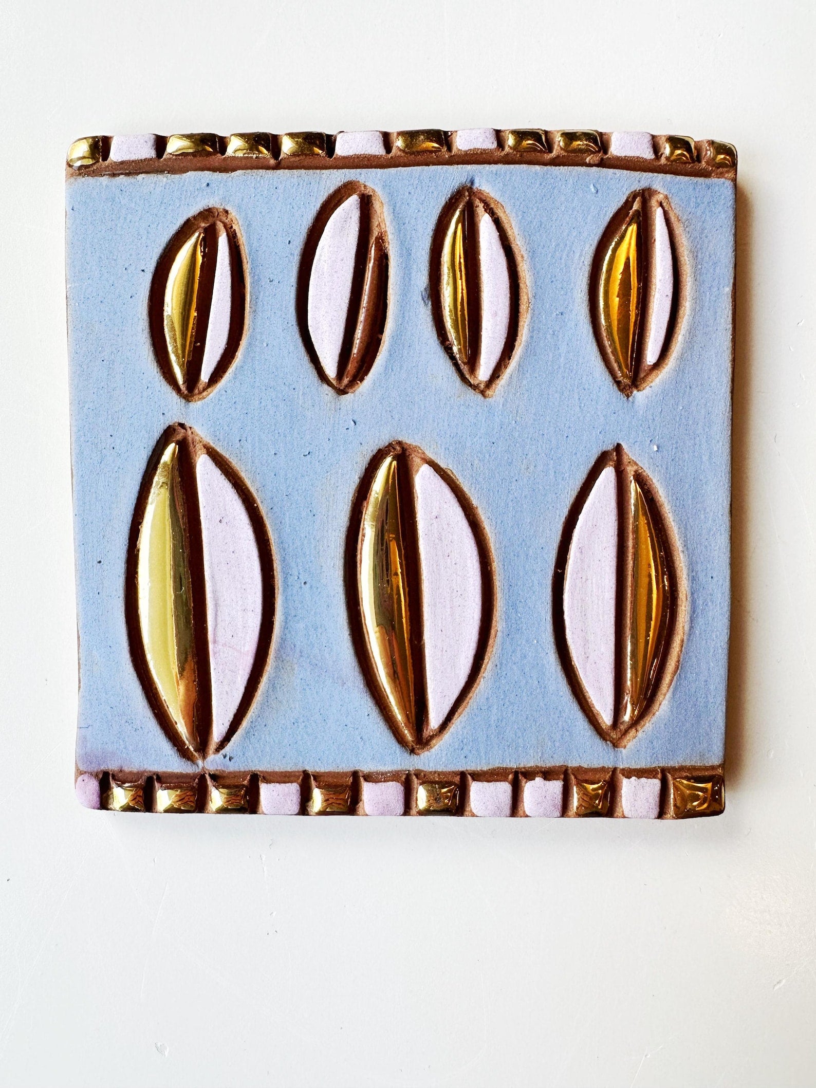 Golden Petal Eyes Tile