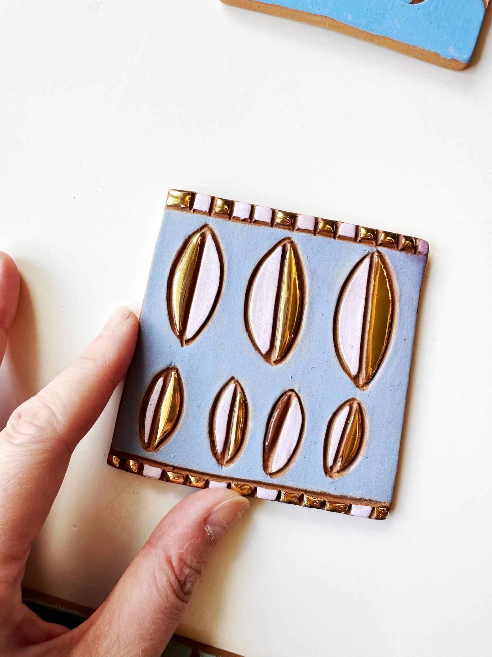 Golden Petal Eyes Tile