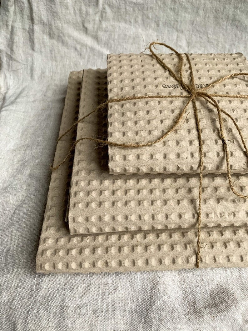 White flecked handmade ceramic plates
