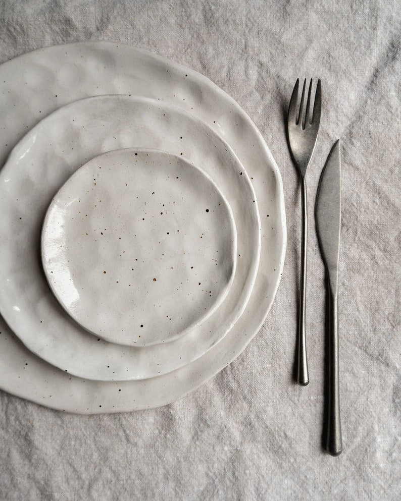 White flecked handmade ceramic plates
