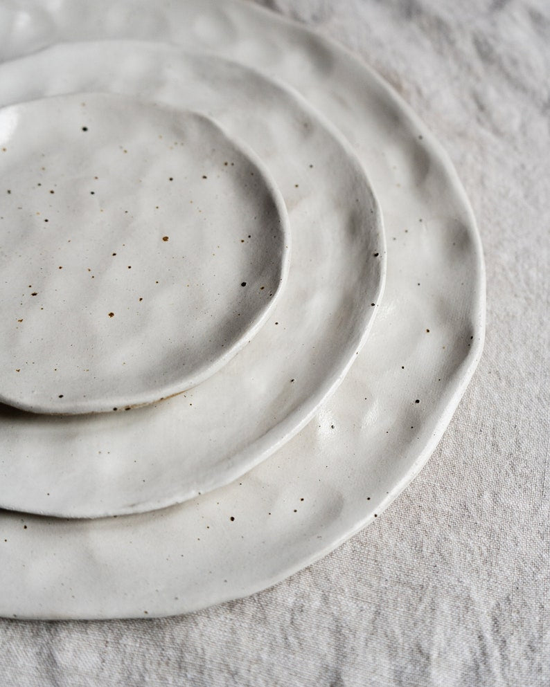 White flecked handmade ceramic plates