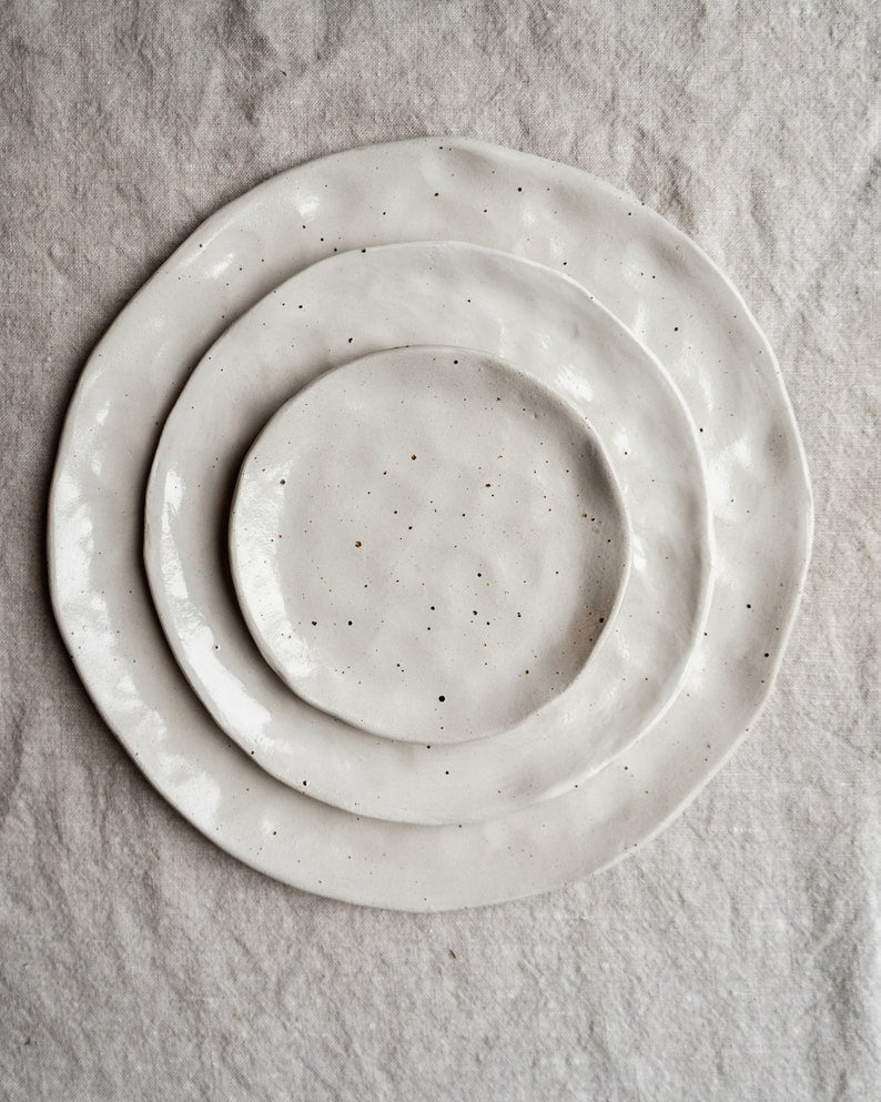 White flecked handmade ceramic plates