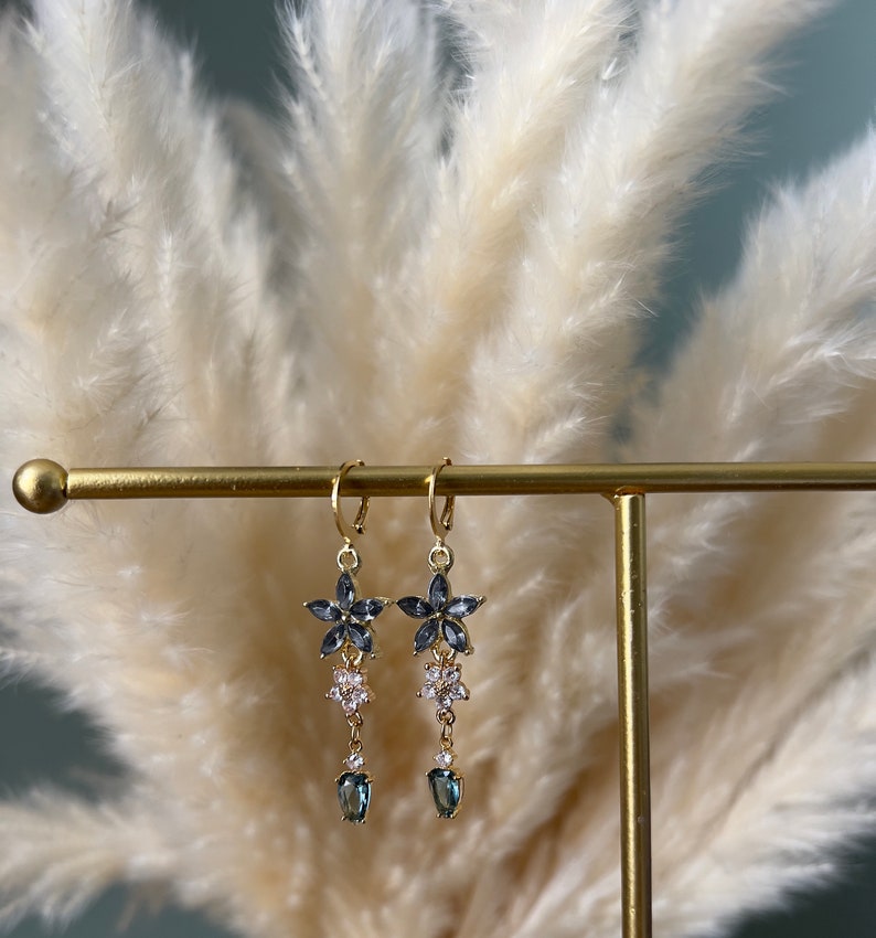 Beautiful grey flower hoop earrings