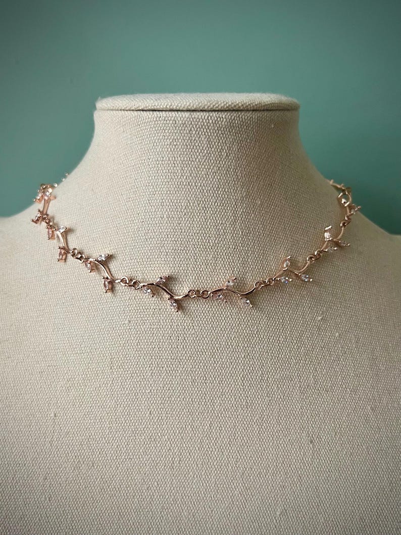 Delicate white leafy vine rose gold choker necklace