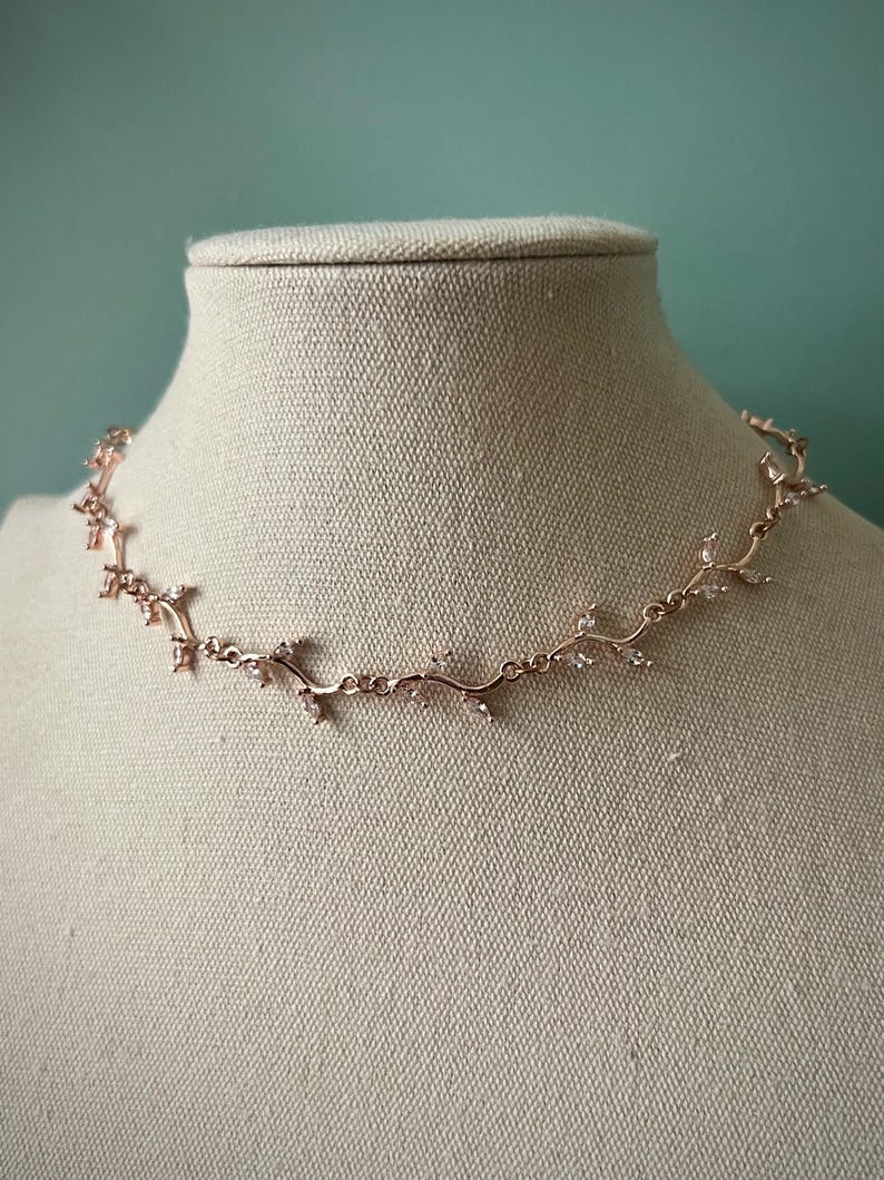 Delicate white leafy vine rose gold choker necklace