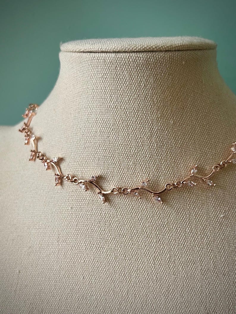 Delicate white leafy vine rose gold choker necklace