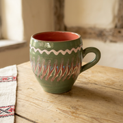 Moss Green Barrel Mug in a Romanian-inspired farmhouse setting