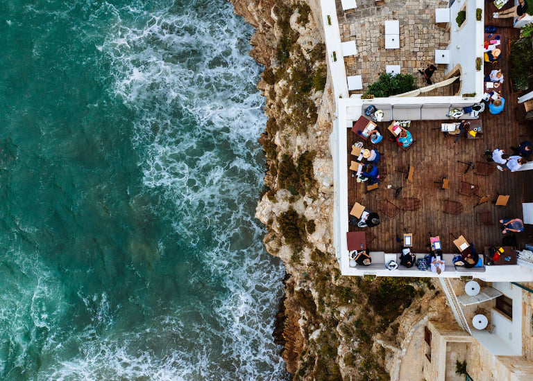Aerial view of a rooftop bar with ocean view