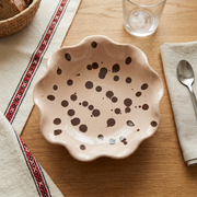 Warm Ecru Ripple Side Bowl in a Romanian-inspired dining-table setting